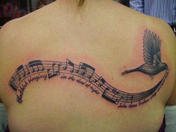 Notas Musicales y Ave con canción The Beatles