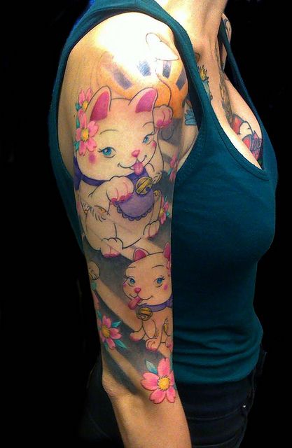 Gatitos con florecillas rosa