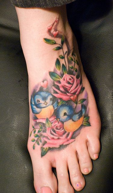 Pajaritos entre rosas