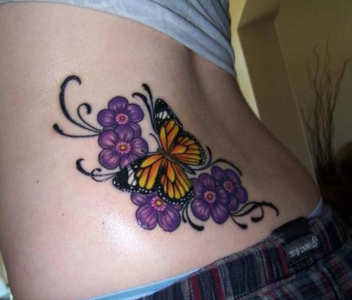 Mariposa con flores violetas