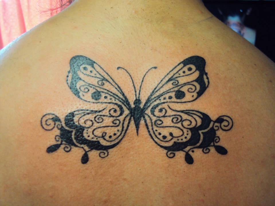 Mariposa en la espalda